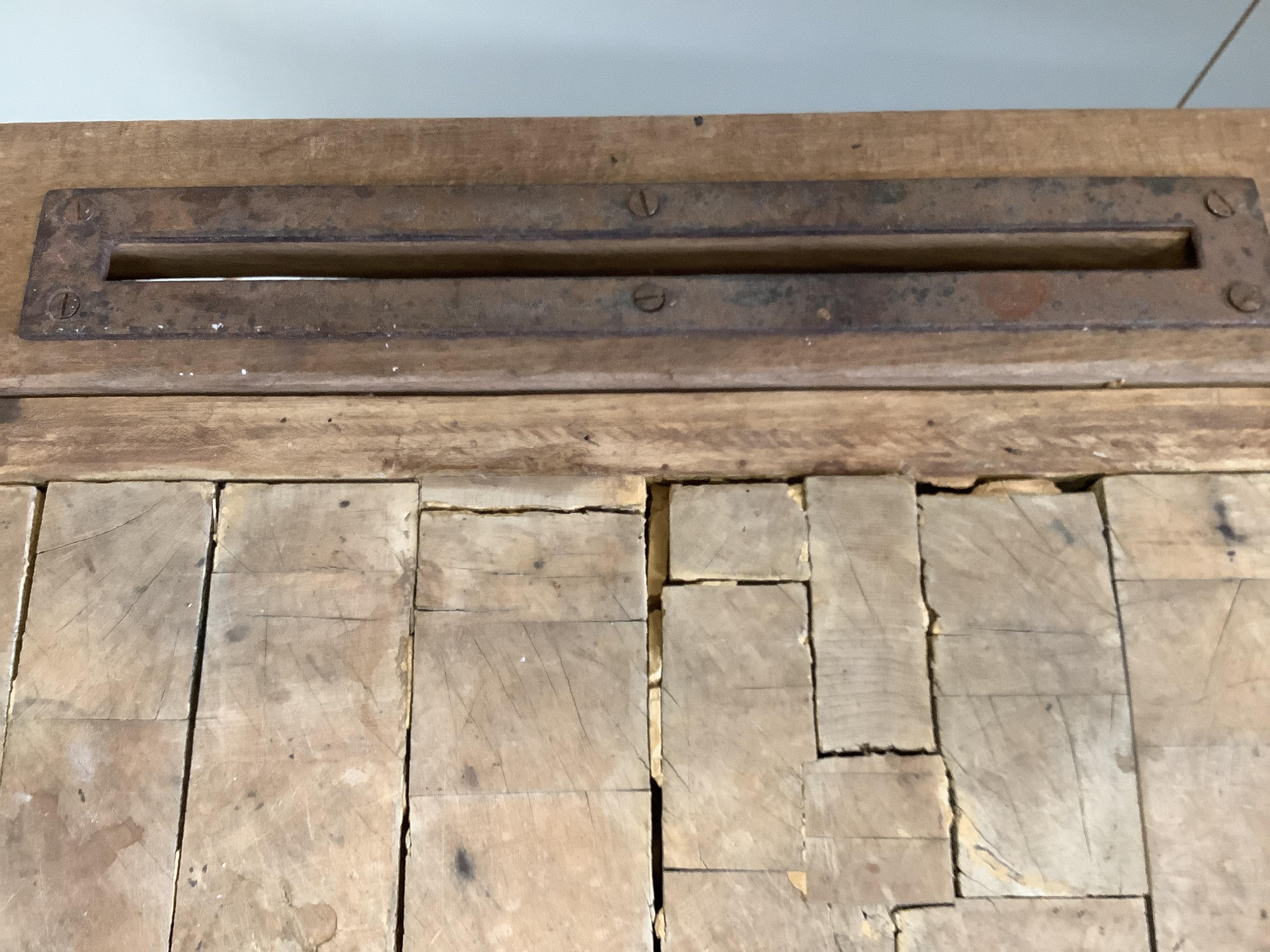 A 19th century French pine and fruitwood butchers block, (evidence of worm, may need treating) width 100cm, depth 60cm, height 80cm